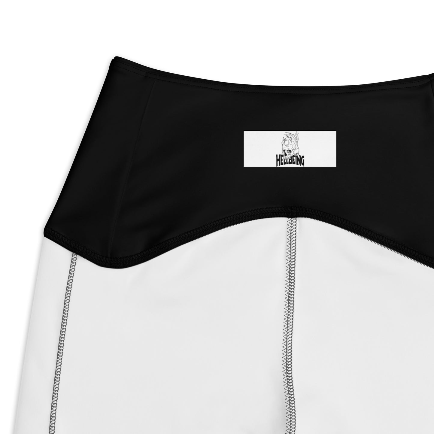 Inside label view of the Hellbeing activewear grayscale women's recycled crossover leggings