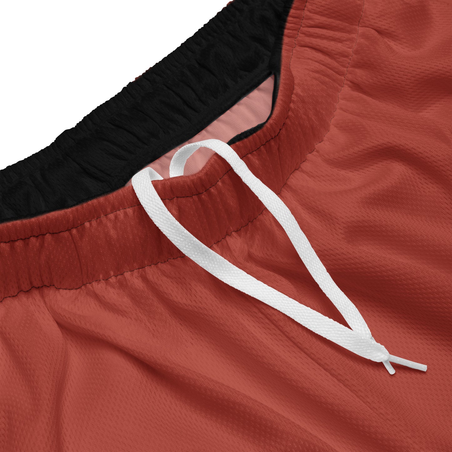 Waistband view of the Hellbeing recycled mesh shorts in Red