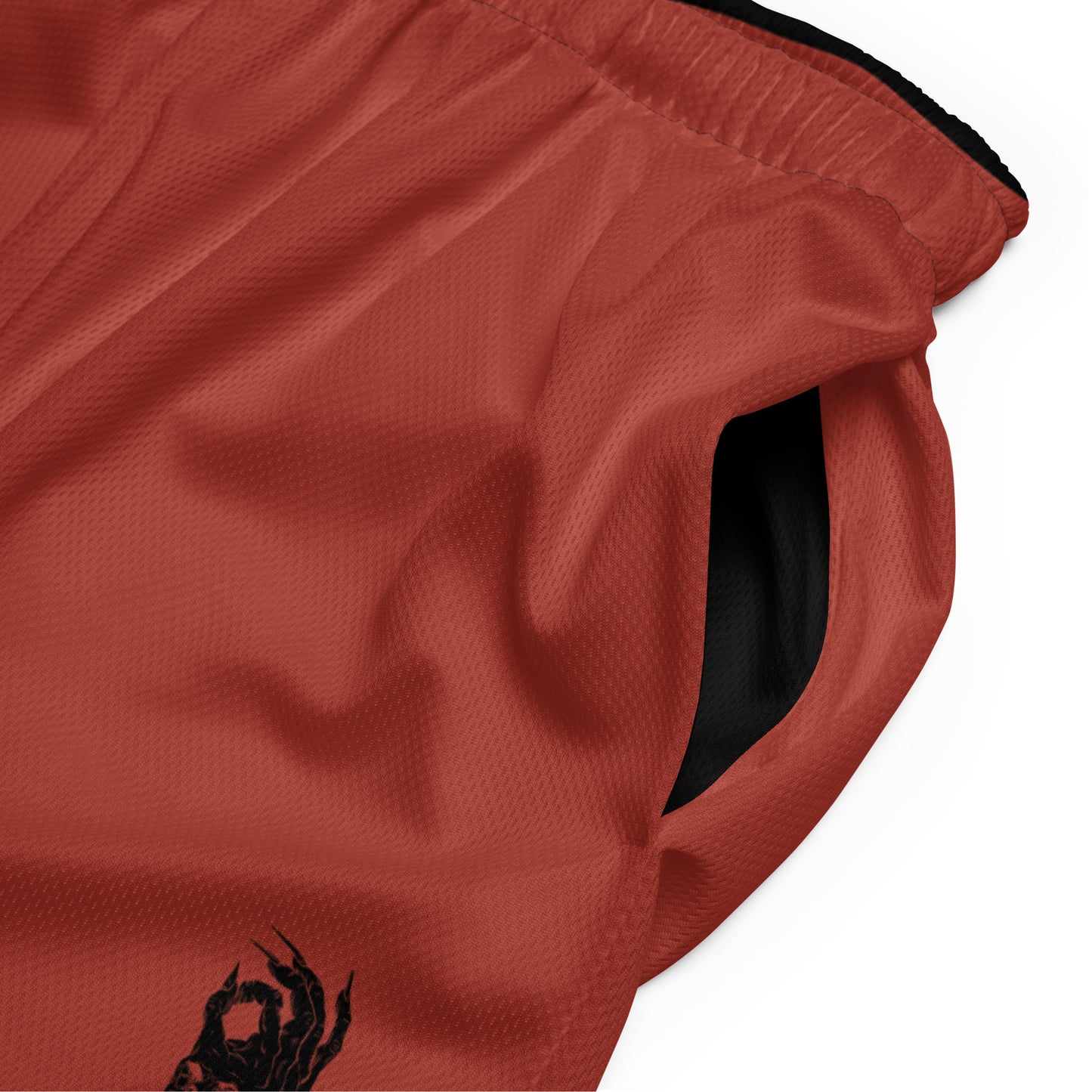 Pocket view of the Hellbeing recycled mesh shorts in Red