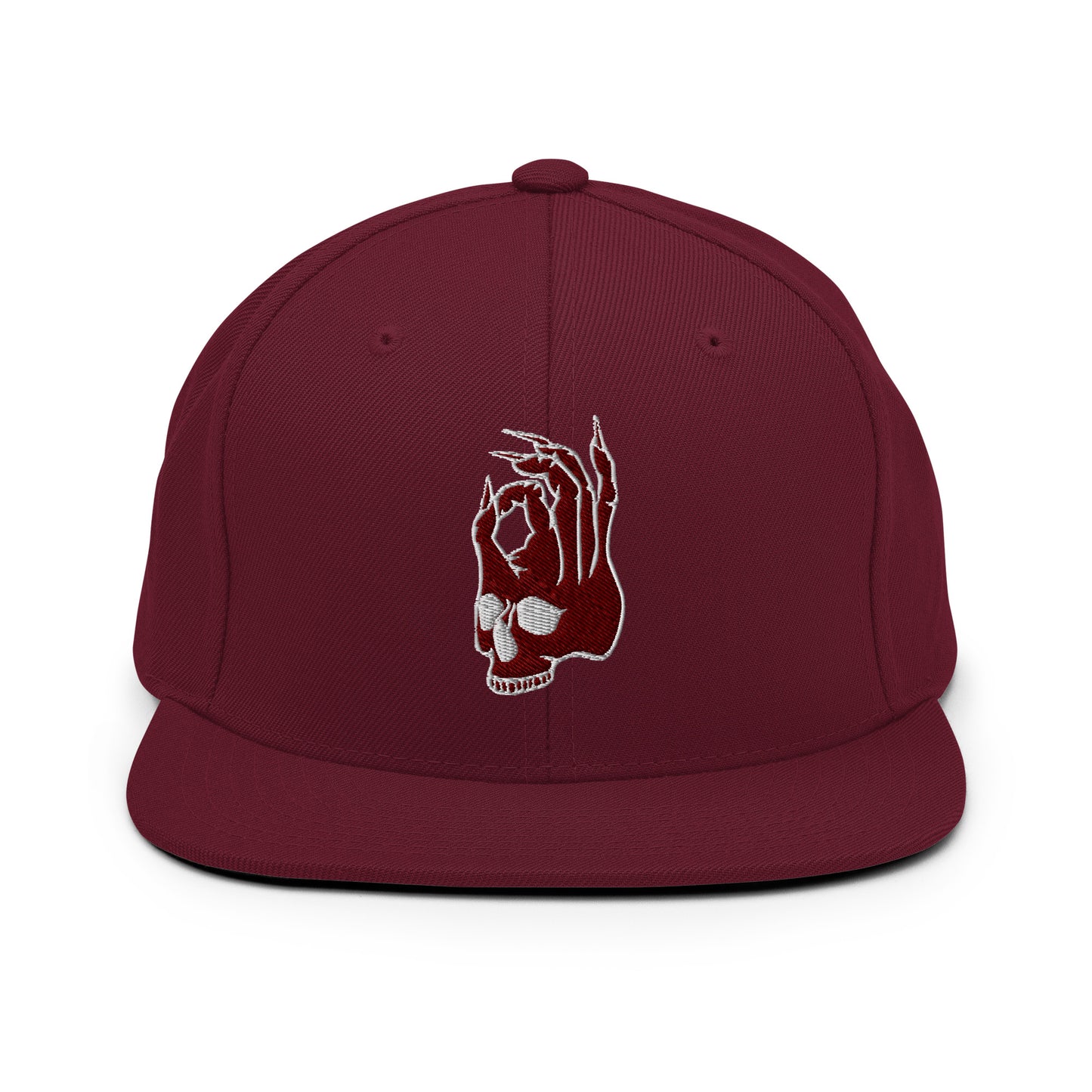 Front view of the Hellbeing skull embroidered classic burgundy snapback hat