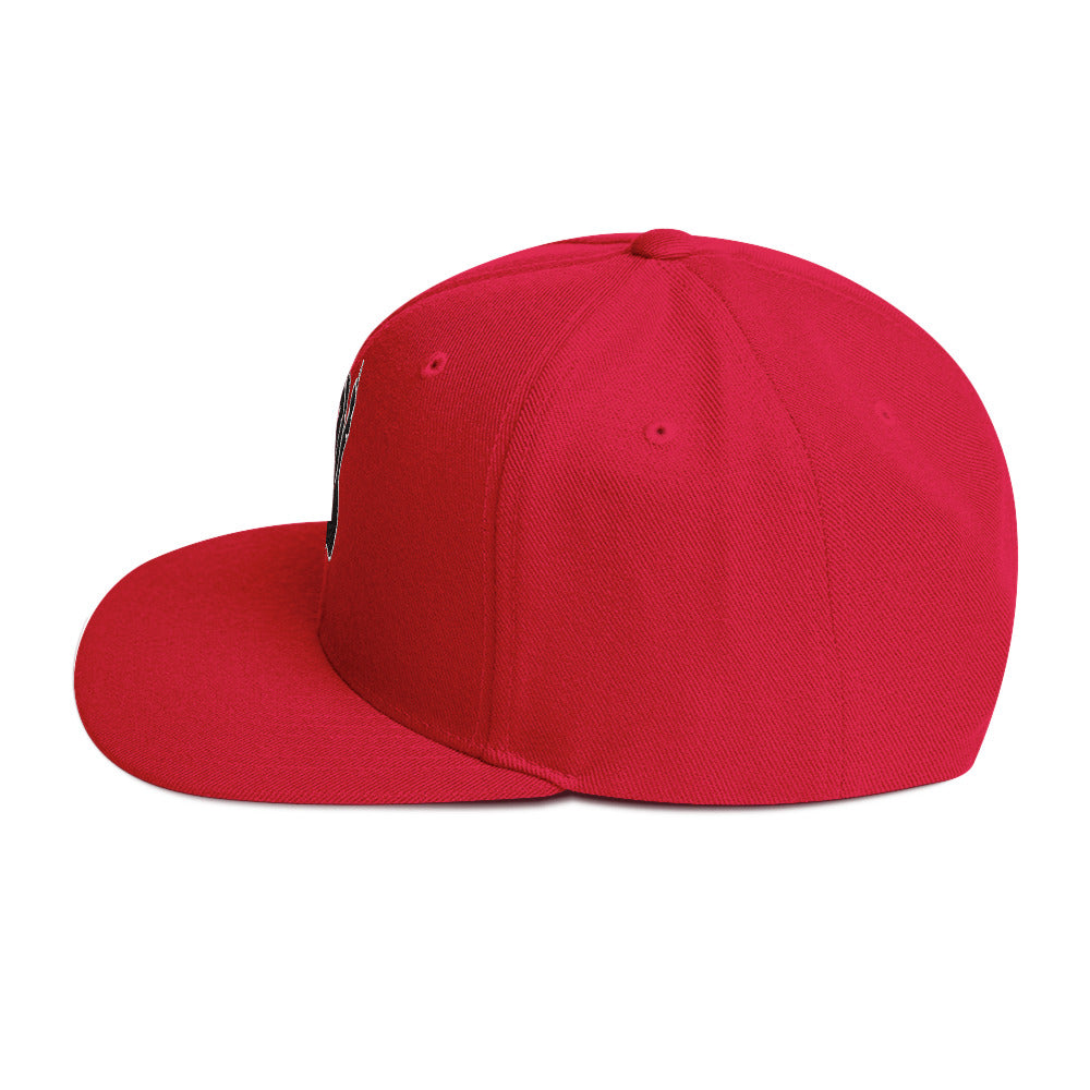 Left side view of the Hellbeing skull embroidered 5 panel red trucker hat