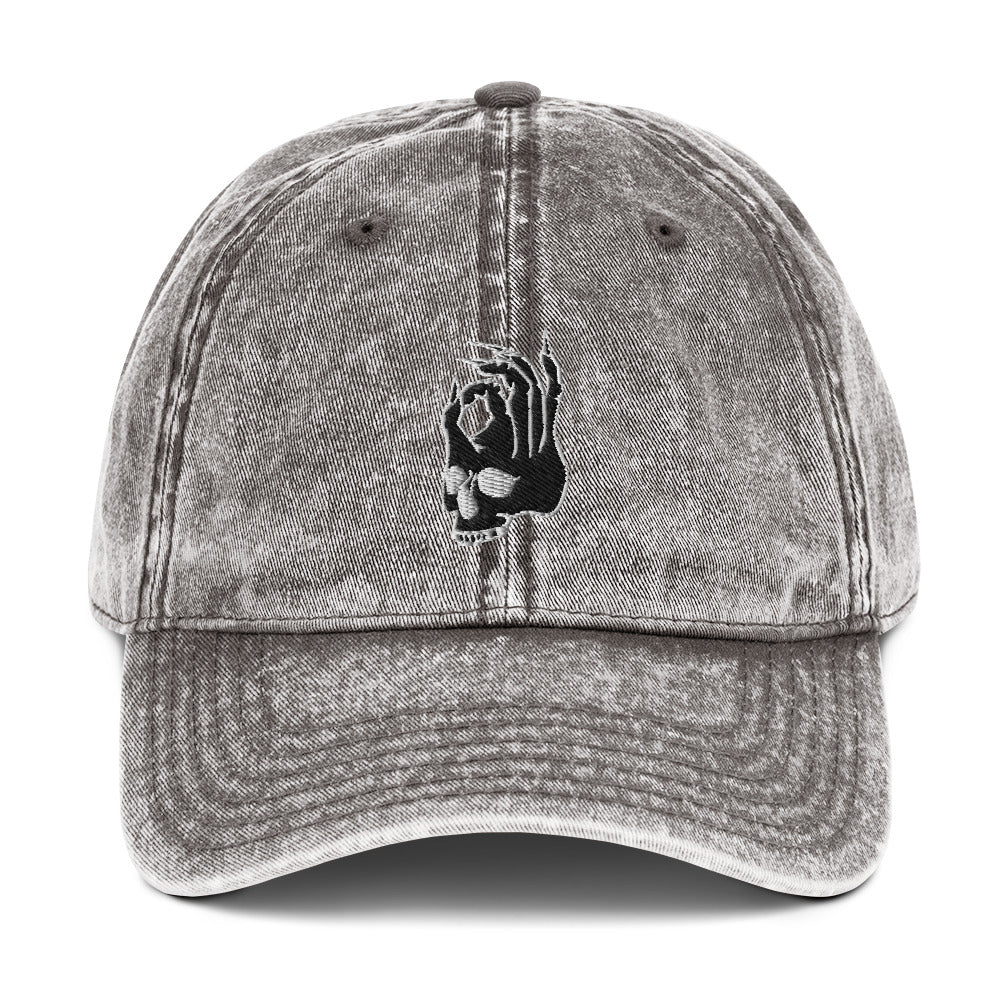 Front view of the Hellbeing skull embroidered vintage gray cap
