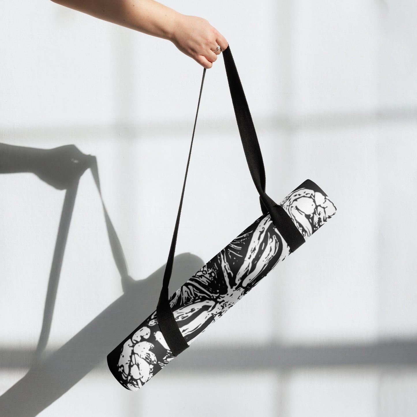 Hellbeing black and white Meditating skeleton rubber Yoga mat with an anti-slip rubber bottom and microsuede top.