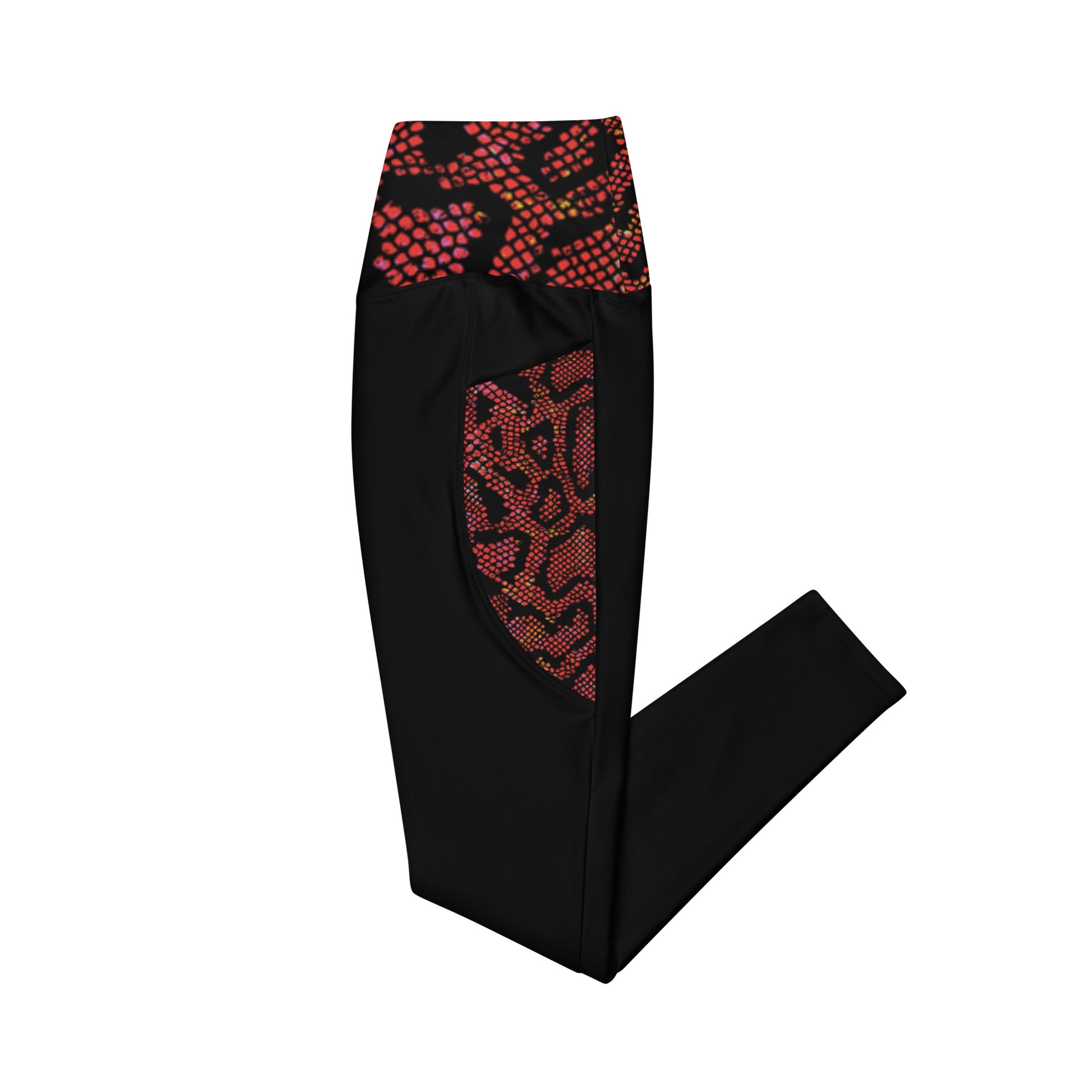 Side folded view of the Hellbeing recycled crossover leggings in black and burgundy snakeskin