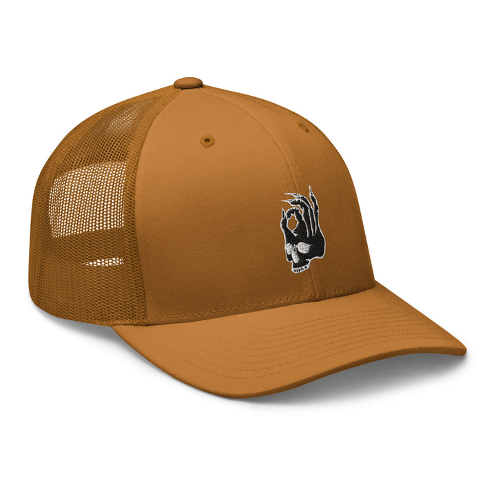Right front view of Hellbeing skull embroidered brown trucker hat