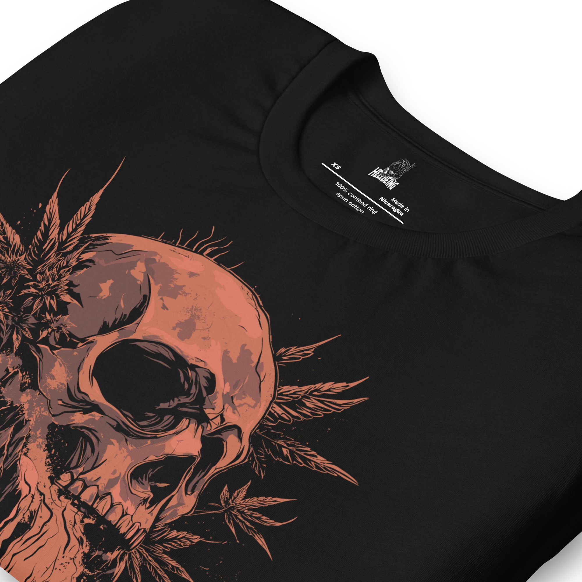 Hellbeing Lava Cake strain skull tee in black, folded front detail