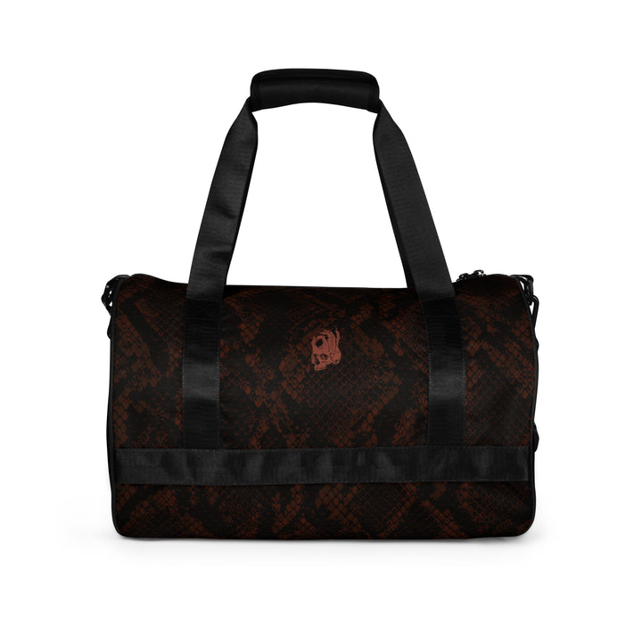 Hellbeing burgundy snakeskin print gym duffel bag with rust-red skull logo, back view