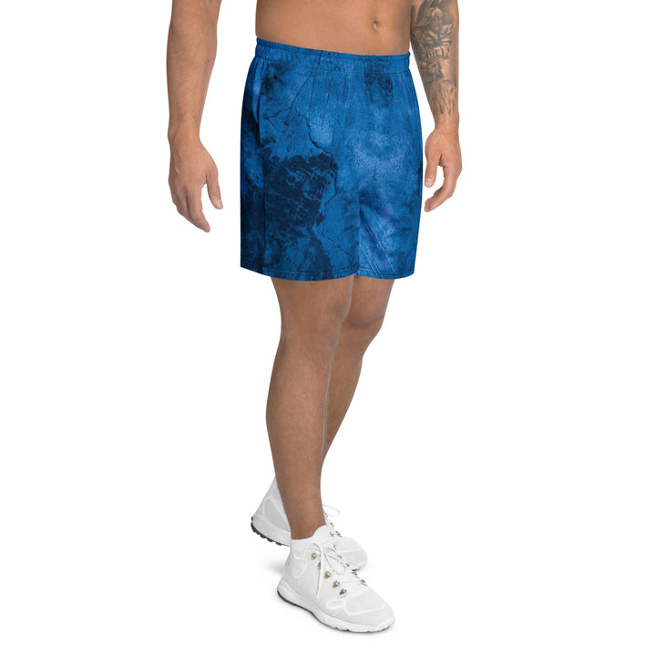 Hellbeing Bottom Line athletic long shorts in blue, right side view