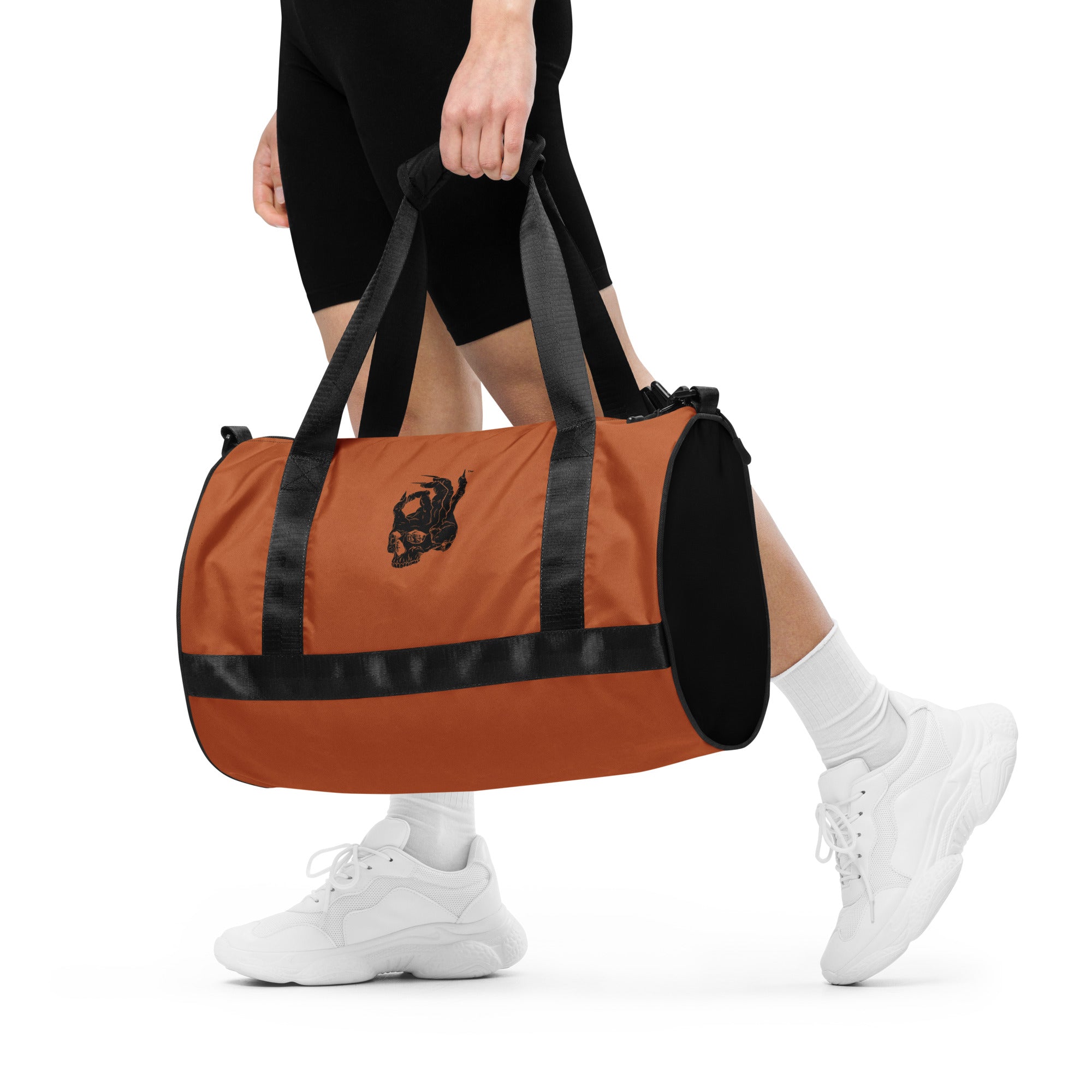 Hellbeing gym bag in burnt orange and black, front close-up