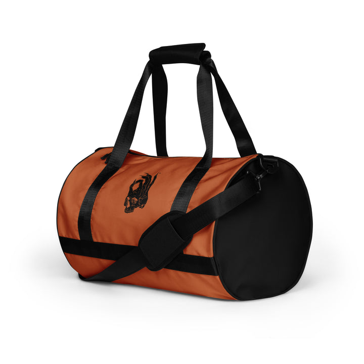 Hellbeing gym bag in burnt orange and black, front angle view