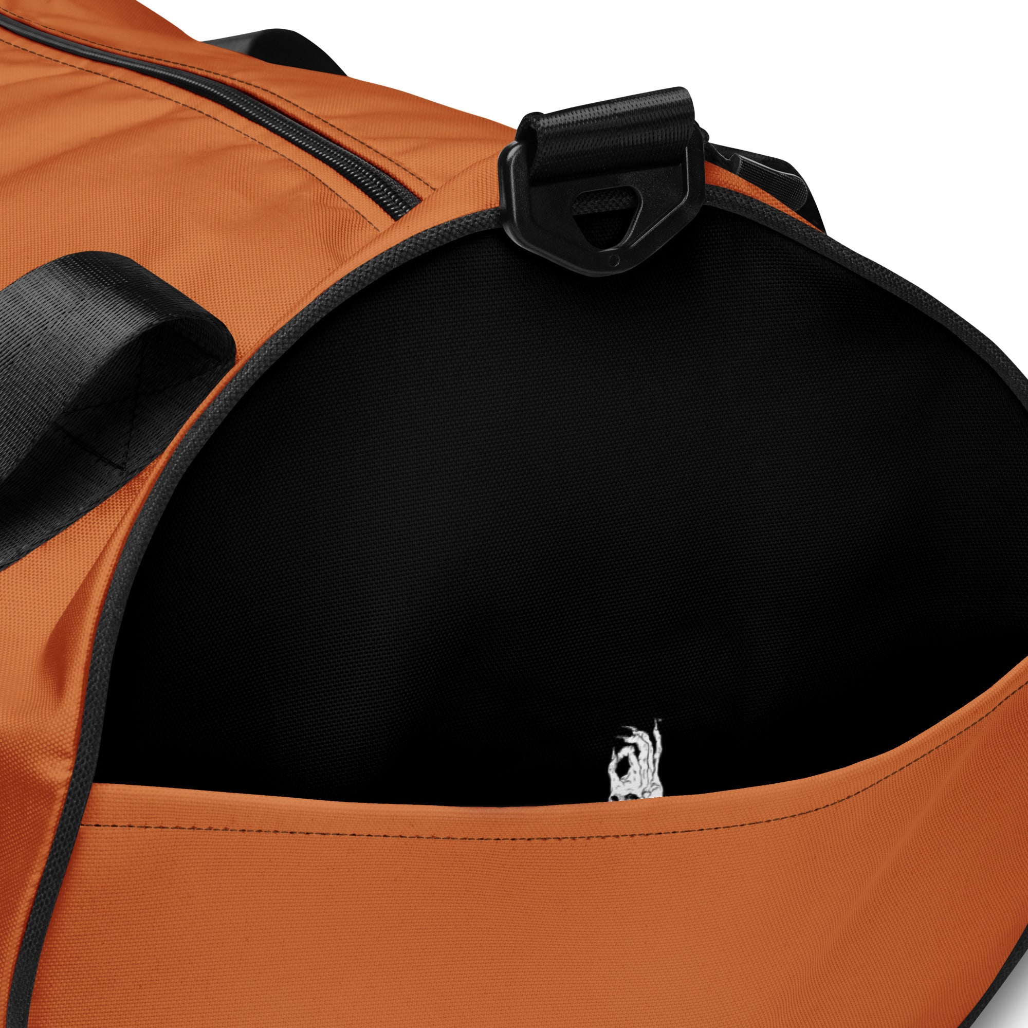 Hellbeing gym bag in burnt orange and black, side detail