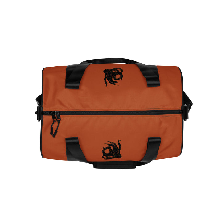 Hellbeing gym bag in burnt orange and black, top view