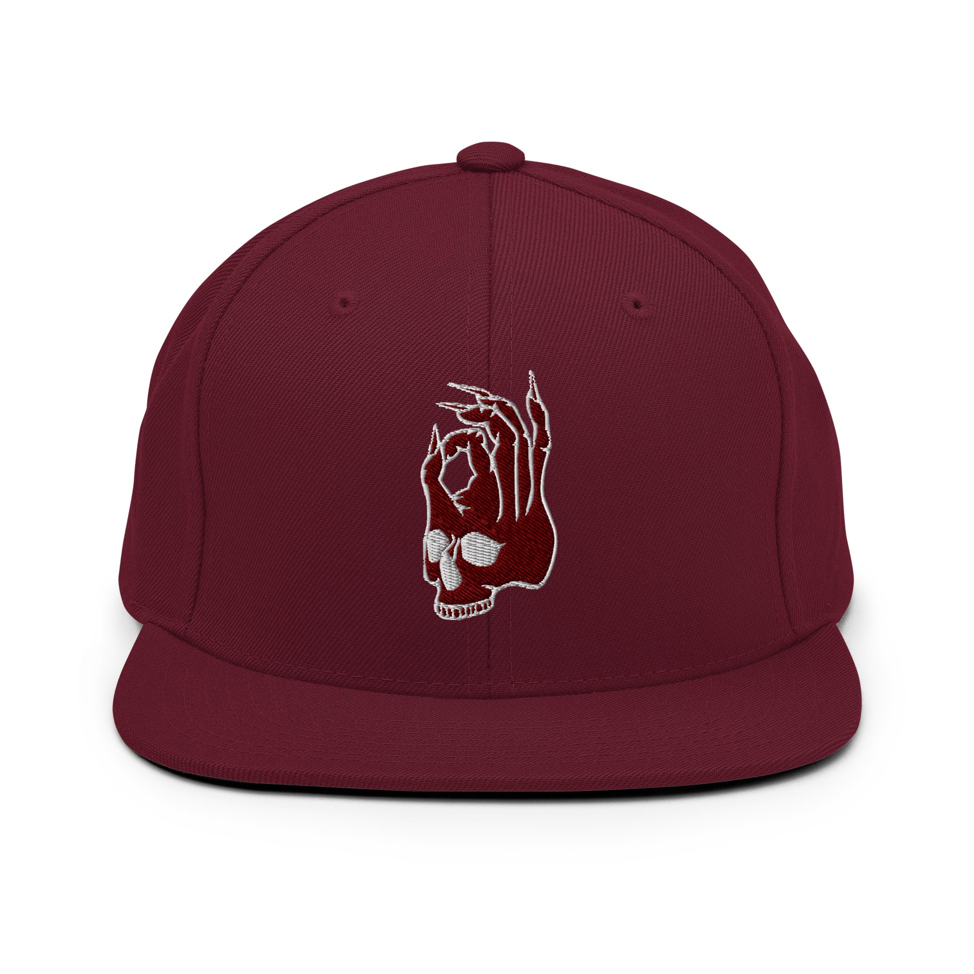 Front view of the Hellbeing skull embroidered classic burgundy snapback hat