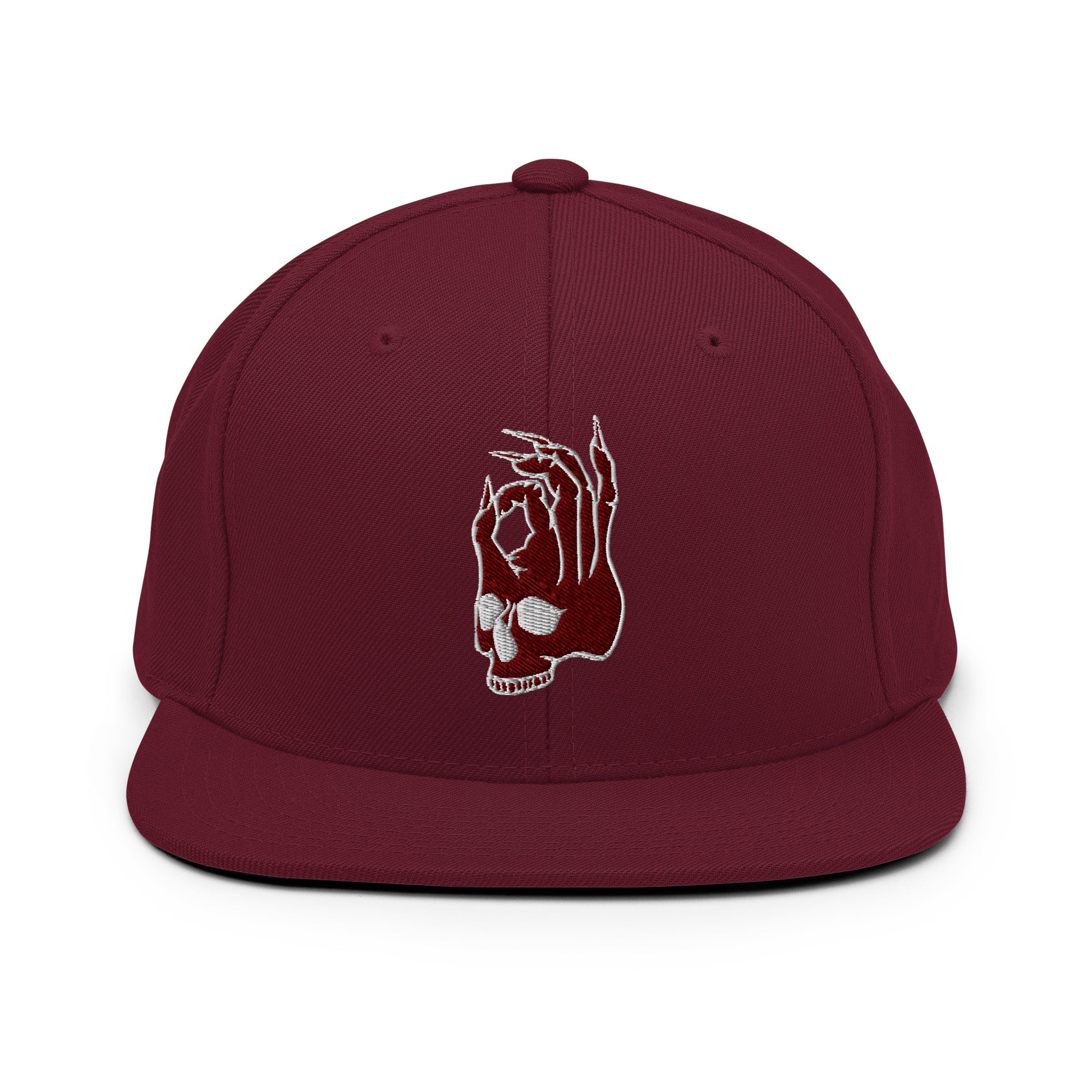 Front view of the Hellbeing skull embroidered classic burgundy snapback hat