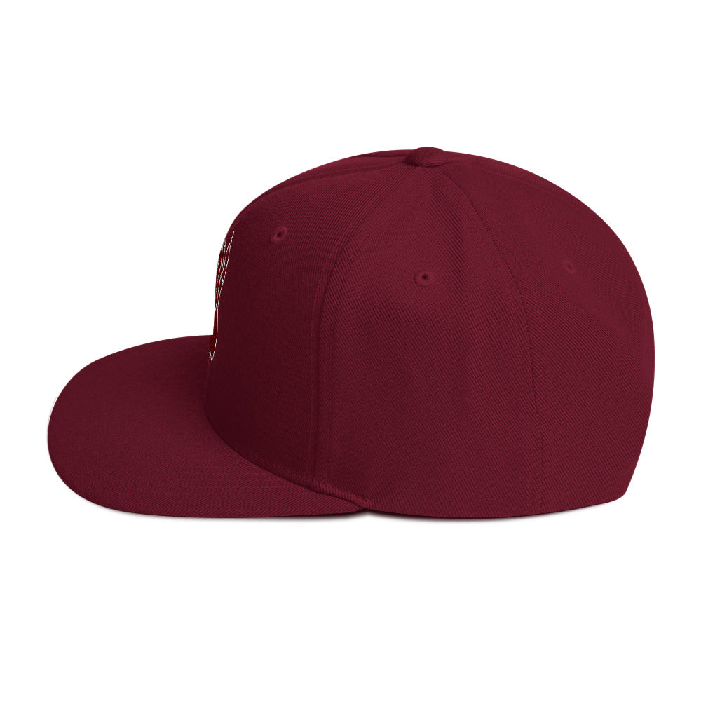 Left side view of the Hellbeing skull embroidered classic burgundy snapback hat