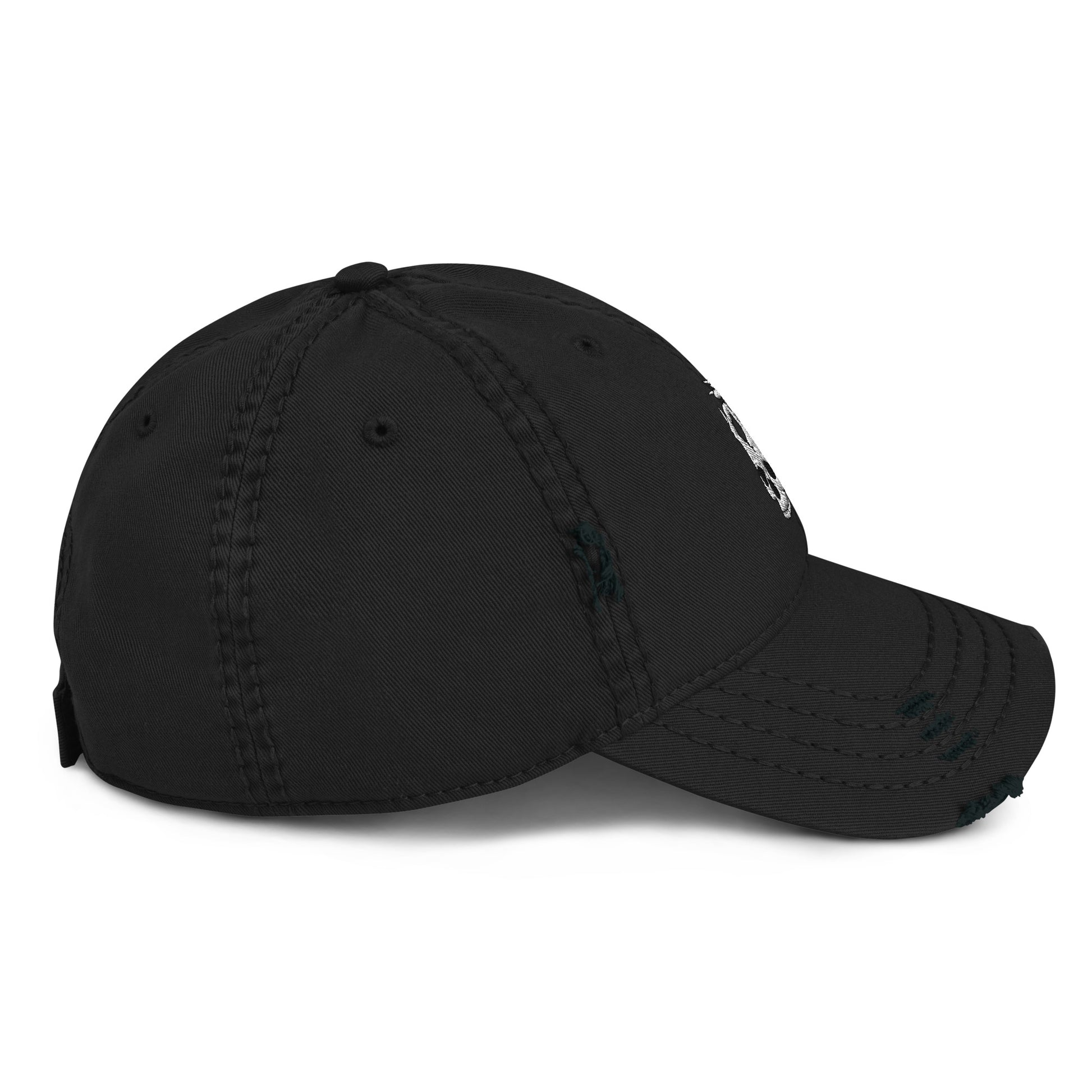 Side view of the Hellbeing skull embroidered distressed black dad hat