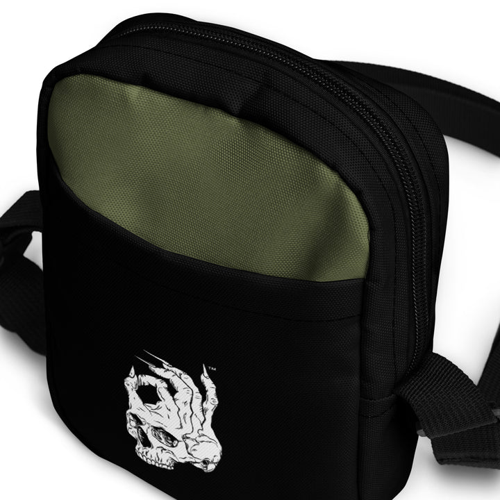 Hellbeing green and black utility crossbody bag, front zoom detail
