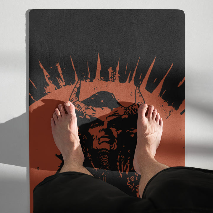 Hellbeing Lucifer's Pulpit yoga mat in red and black, standing rolled view