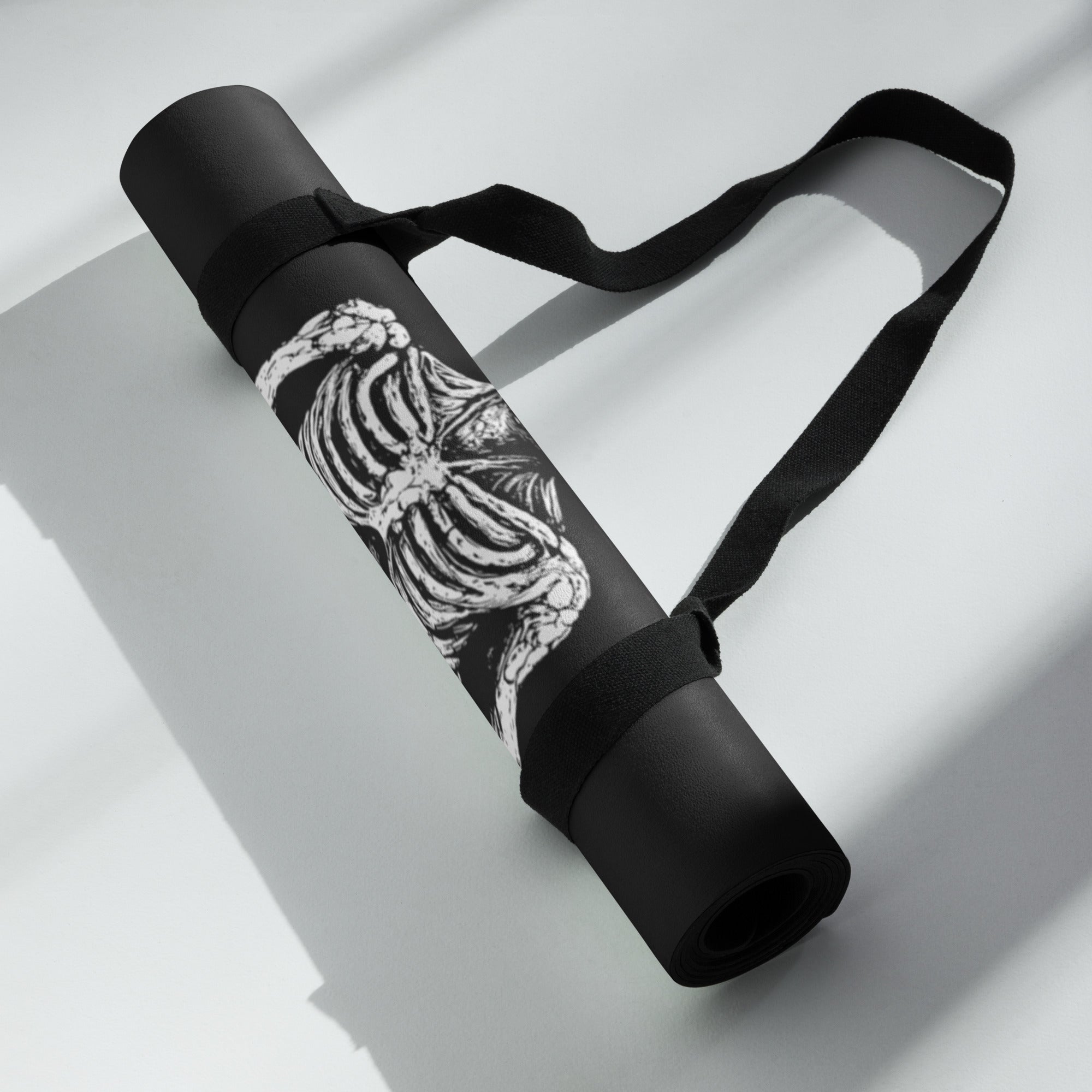 Hellbeing meditating skeleton yoga mat, rolled up