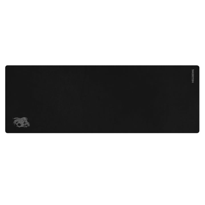 Hellbeing solid black yoga and exercise mat with gray skull logo in the corner, product photo 1 of 7