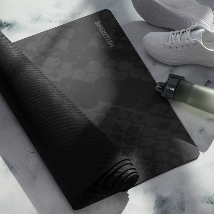 Hellbeing black snakeskin print yoga and exercise mat with skull logo in the corner, product photo 5 of 7