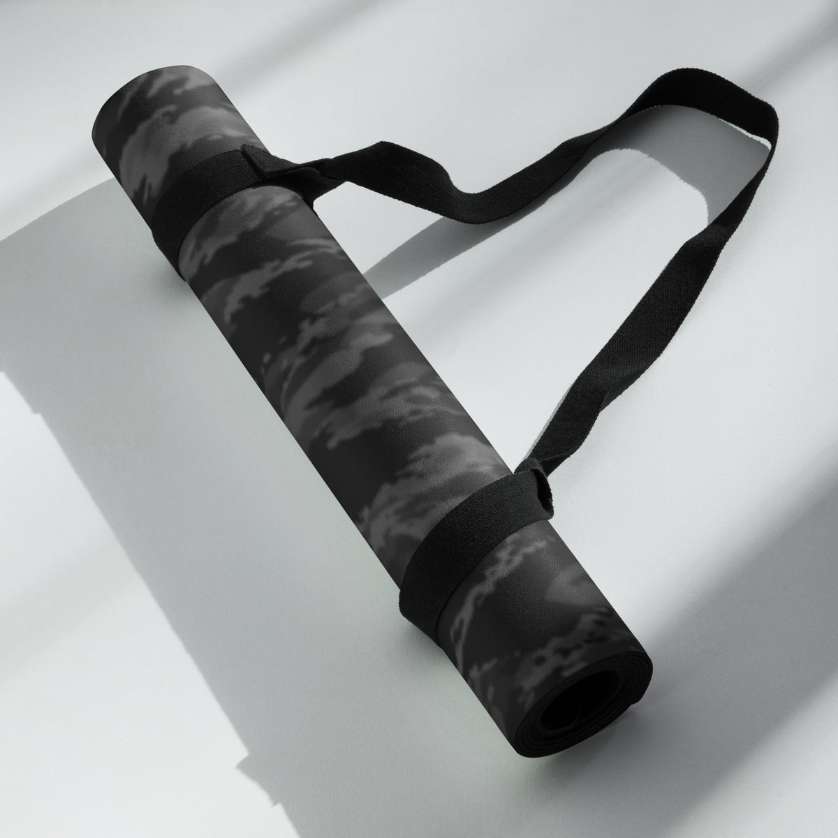 Hellbeing black tiger stripe camo yoga and exercise mat with skull logo in the corner, product photo 5 of 6