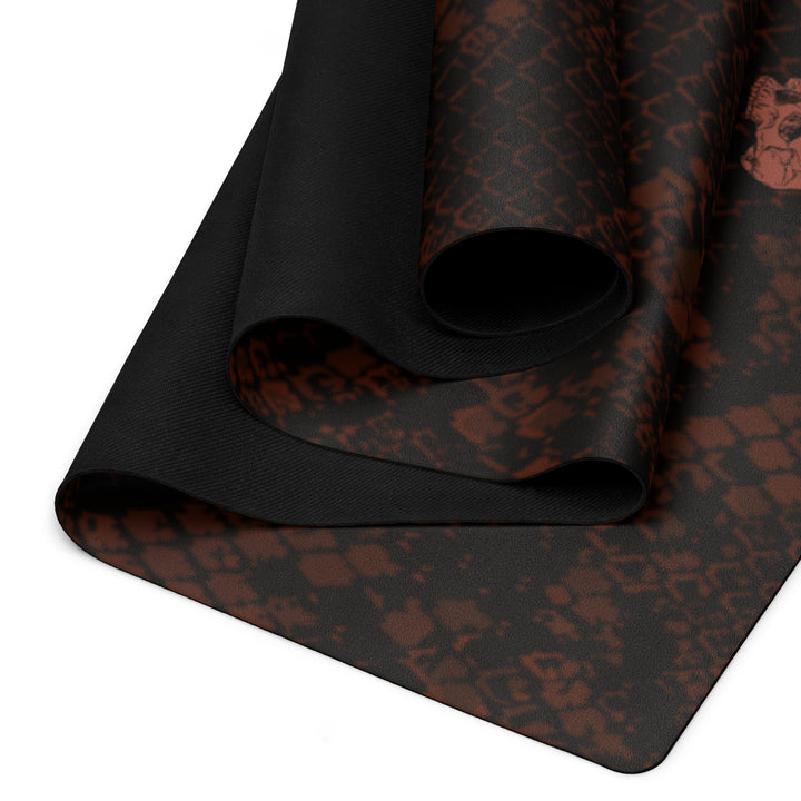 Hellbeing burgundy snakeskin print yoga and exercise mat with rust-red skull logo in the corner, product photo 2 of 6